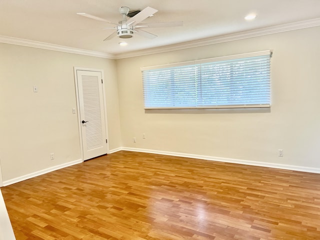 850 Holly Ln, Boca Raton, FL 33486 - unfurnished room featuring ornamental molding, baseboards, a ceiling fan, and wood finished floors