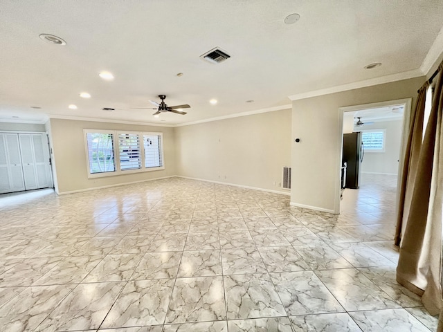850 Holly Ln, Boca Raton, FL 33486 - spare room featuring a healthy amount of sunlight, visible vents, and ceiling fan