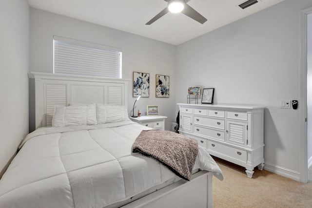 bedroom with light carpet and ceiling fan