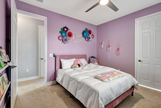 carpeted bedroom with ceiling fan