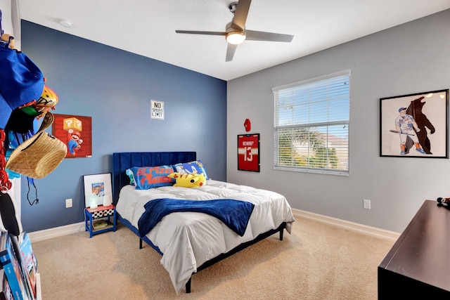 carpeted bedroom with ceiling fan