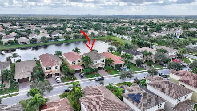 drone / aerial view featuring a water view