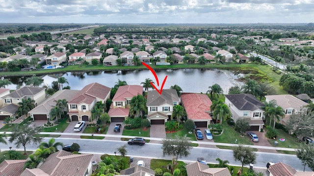 drone / aerial view featuring a water view