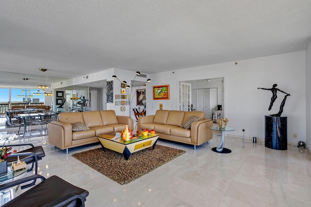 living room featuring a textured ceiling