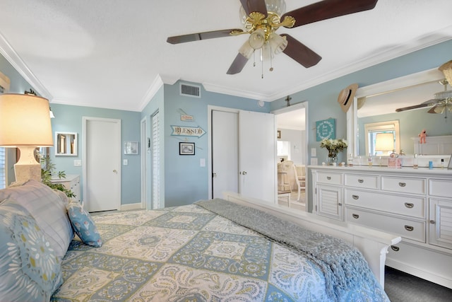 bedroom with ceiling fan and crown molding