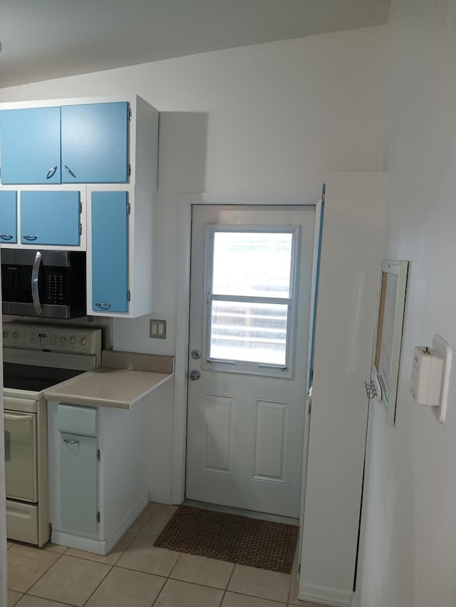 interior space featuring light tile patterned flooring