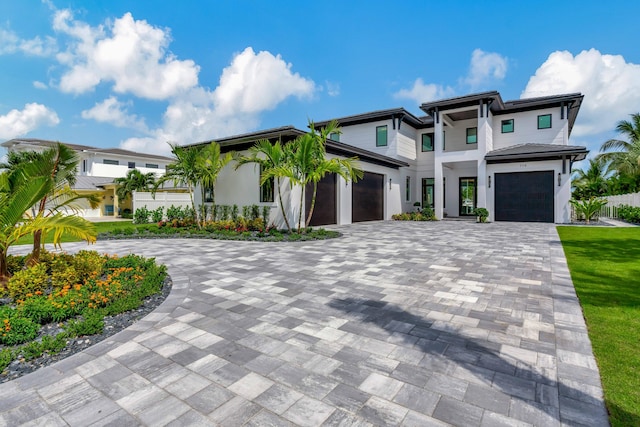 view of front of property featuring a garage