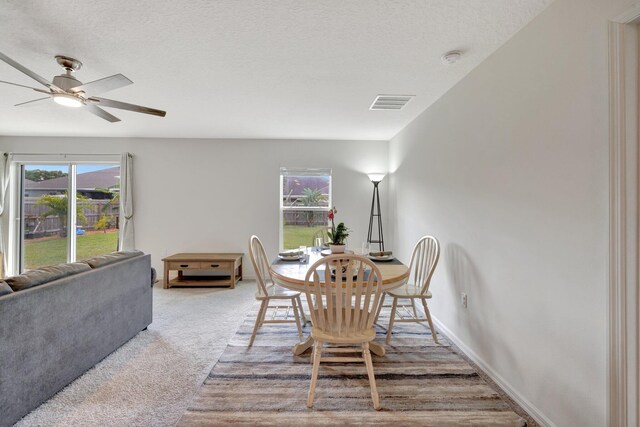 kitchen with a kitchen island with sink, sink, white cabinets, and stainless steel appliances