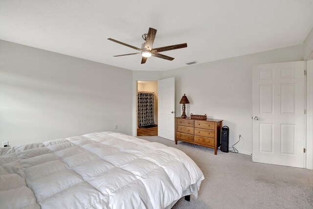 unfurnished bedroom featuring a textured ceiling, light colored carpet, and a closet