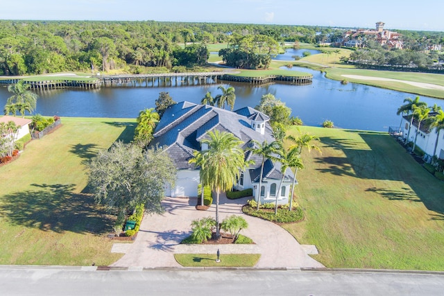 birds eye view of property featuring a water view