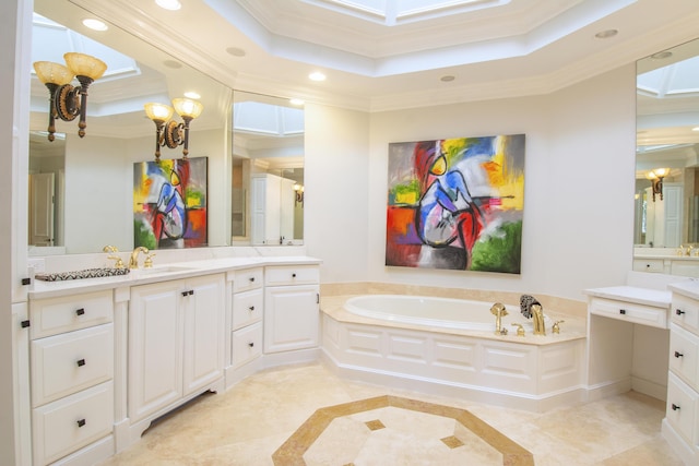 bathroom with a bath, vanity, a raised ceiling, and ornamental molding