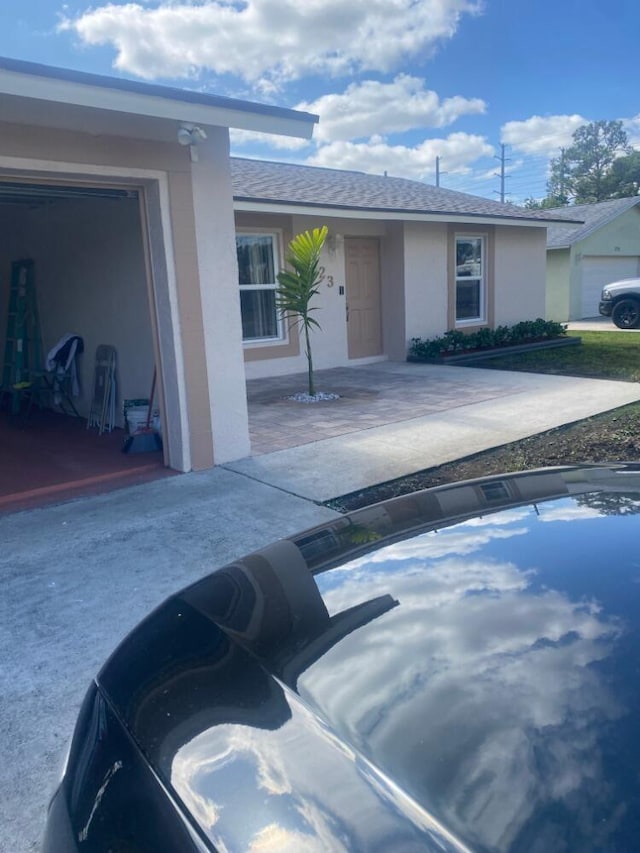 view of property exterior with a garage