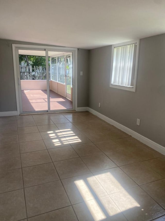 empty room featuring light tile patterned floors