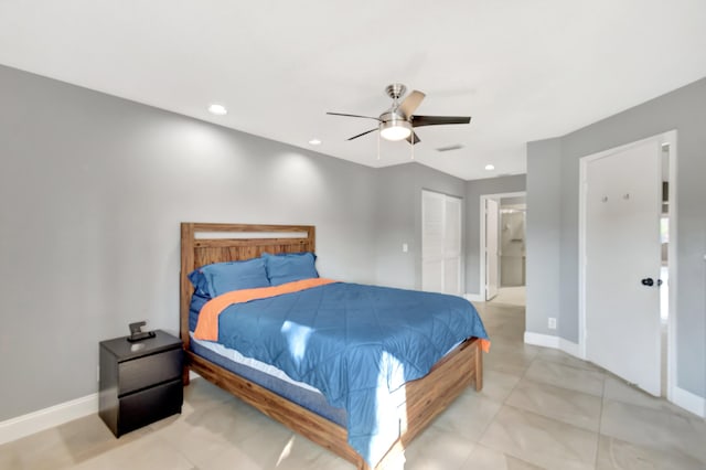 bedroom featuring ceiling fan and a closet