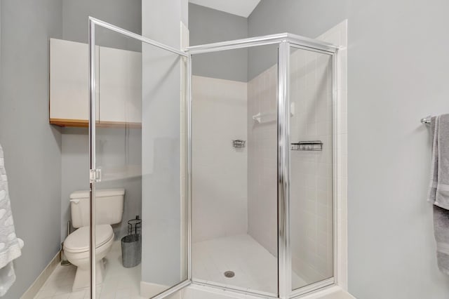 bathroom featuring walk in shower and toilet