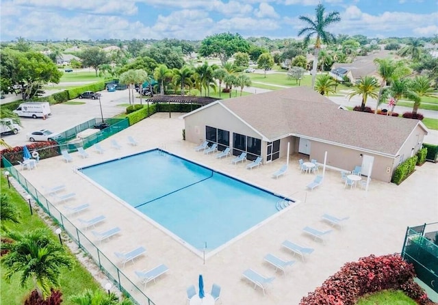 view of swimming pool with a patio area