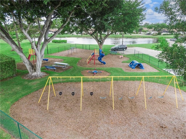 view of community featuring a water view and a playground