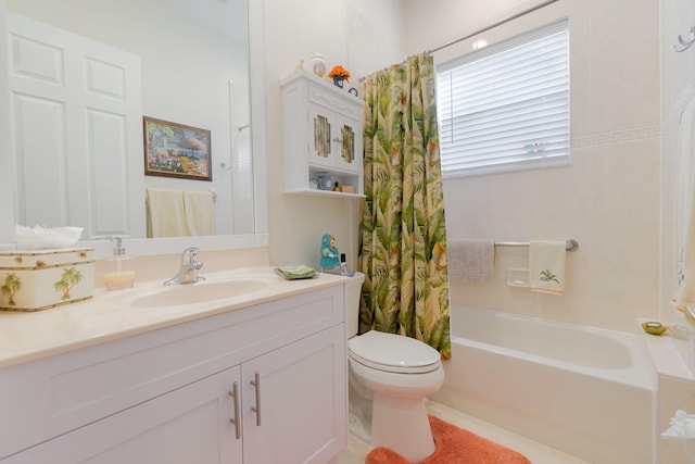 full bathroom with vanity, toilet, and shower / bath combo with shower curtain