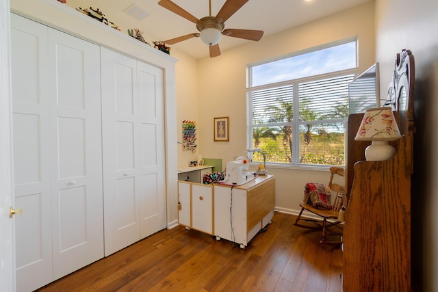 interior space featuring dark hardwood / wood-style floors and ceiling fan