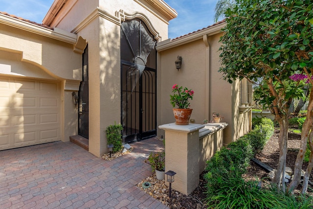 property entrance with a garage