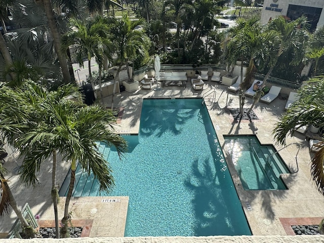 view of swimming pool with a patio