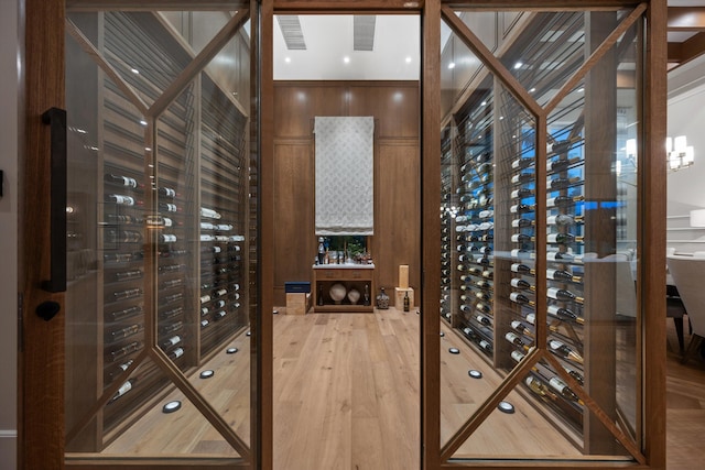 wine room with hardwood / wood-style flooring