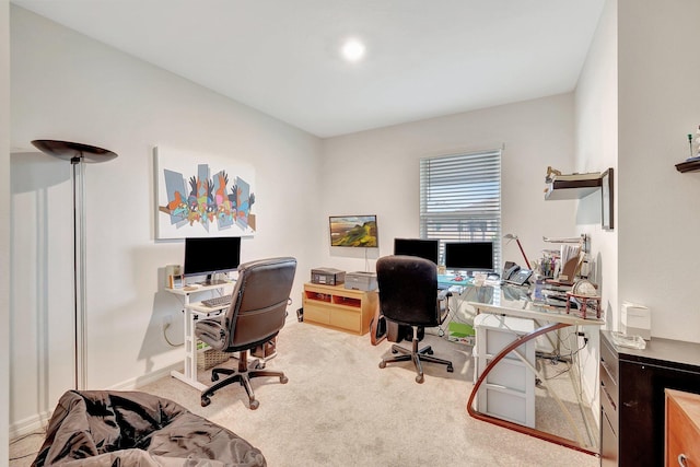 office area with light colored carpet