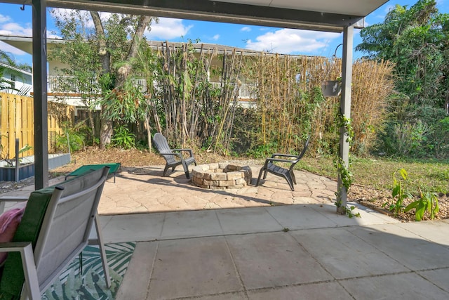 view of patio / terrace featuring an outdoor fire pit