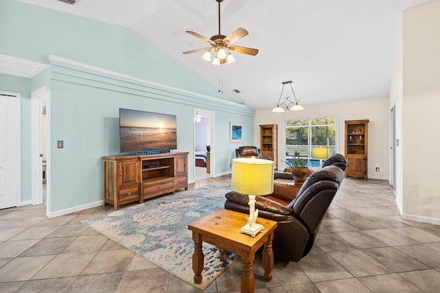 living room featuring ceiling fan, lofted ceiling, and light tile patterned floors