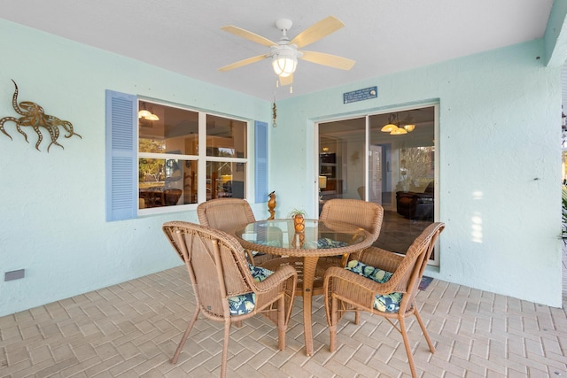 dining space featuring ceiling fan