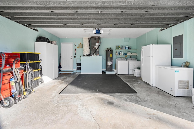 garage with electric water heater, electric panel, refrigerator, white refrigerator, and independent washer and dryer