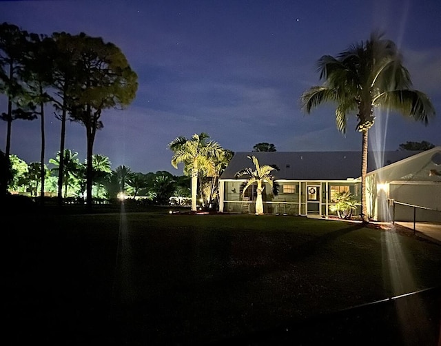 view of yard at night