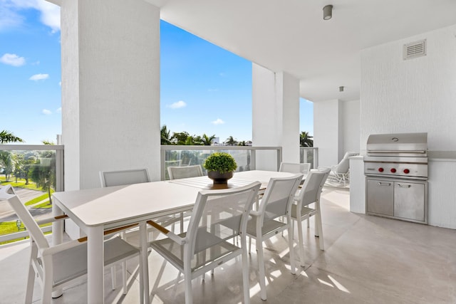 view of patio with a grill and area for grilling