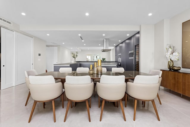 dining room featuring light tile patterned flooring