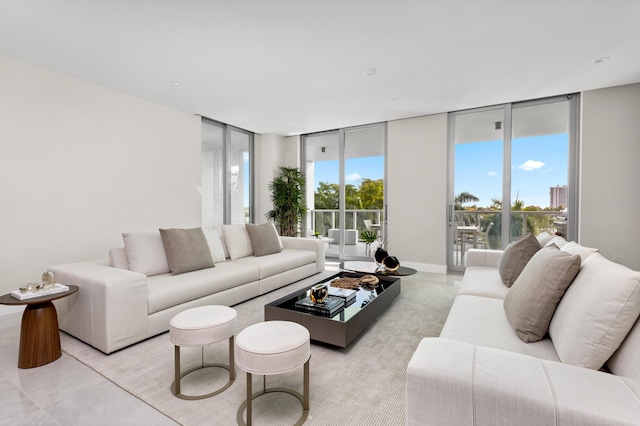 living room featuring a wall of windows