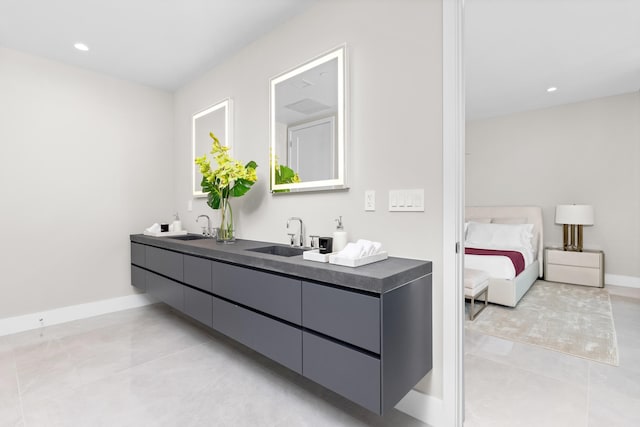 bathroom featuring tile patterned floors and vanity