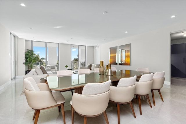 dining room with floor to ceiling windows