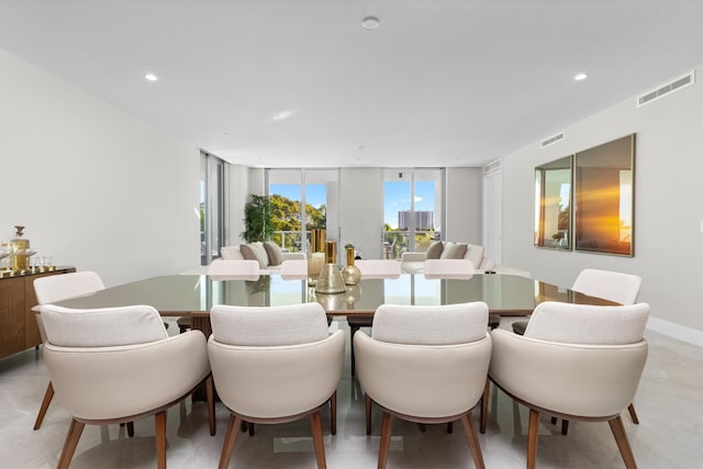 dining room with floor to ceiling windows