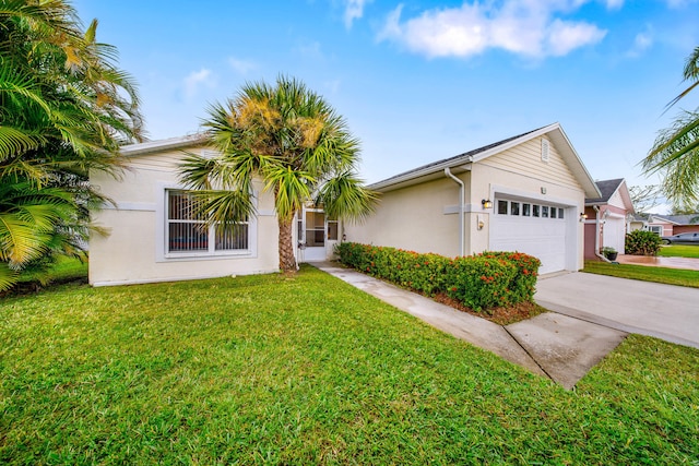 ranch-style home with a front lawn and a garage