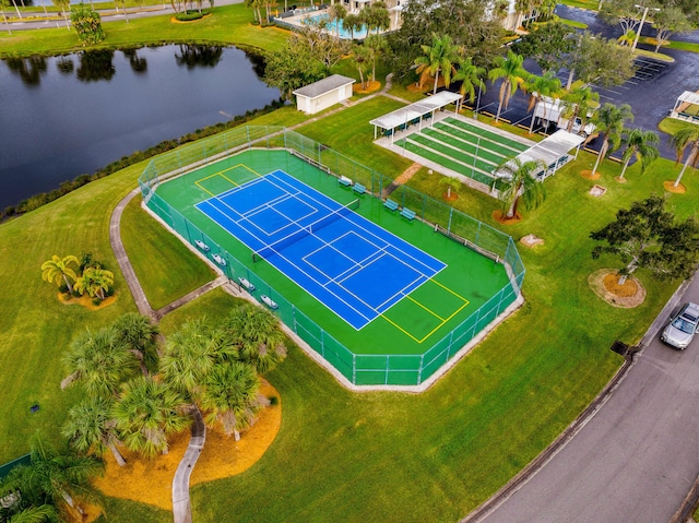 bird's eye view with a water view