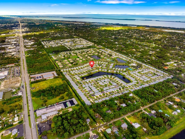 drone / aerial view featuring a water view