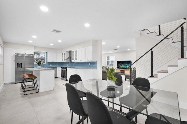 dining space with a healthy amount of sunlight