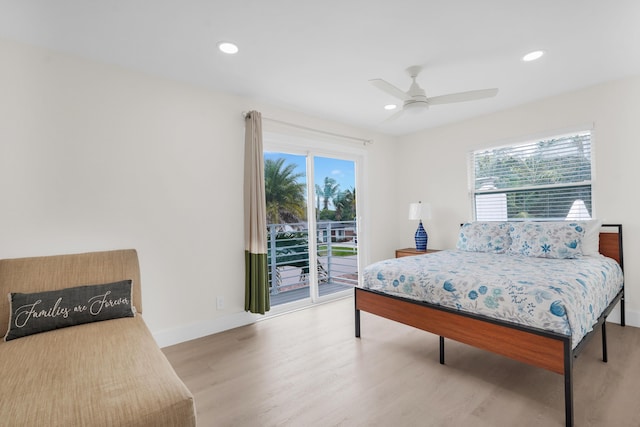 bedroom with ceiling fan, light hardwood / wood-style floors, and access to exterior