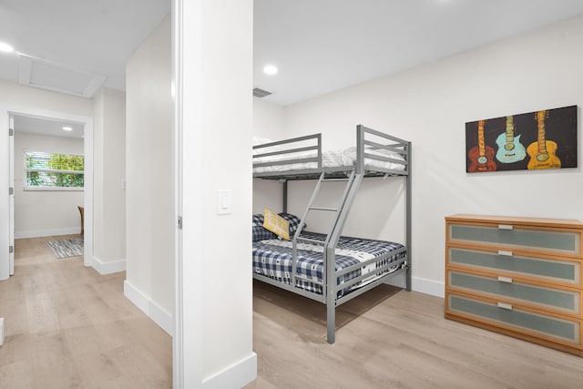 bedroom with light hardwood / wood-style flooring