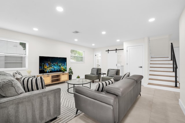 living room with a barn door