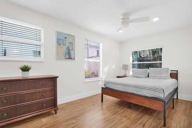 bedroom featuring ceiling fan and light wood-type flooring