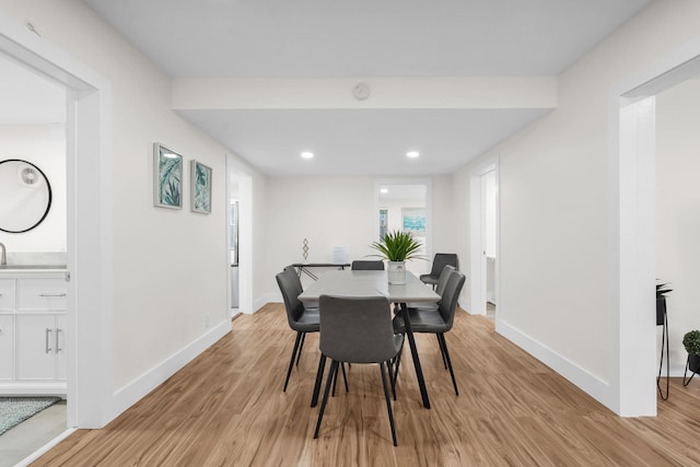 dining room featuring light hardwood / wood-style floors