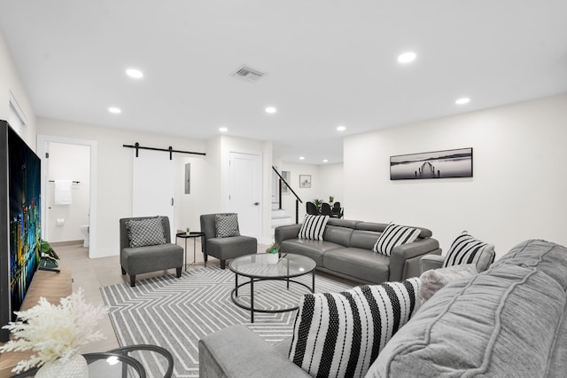 living room featuring a barn door