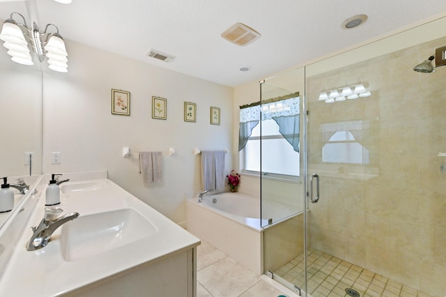 bathroom with tile patterned flooring, vanity, independent shower and bath, and an inviting chandelier