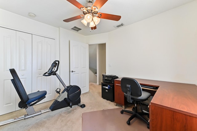 office area with ceiling fan and light colored carpet